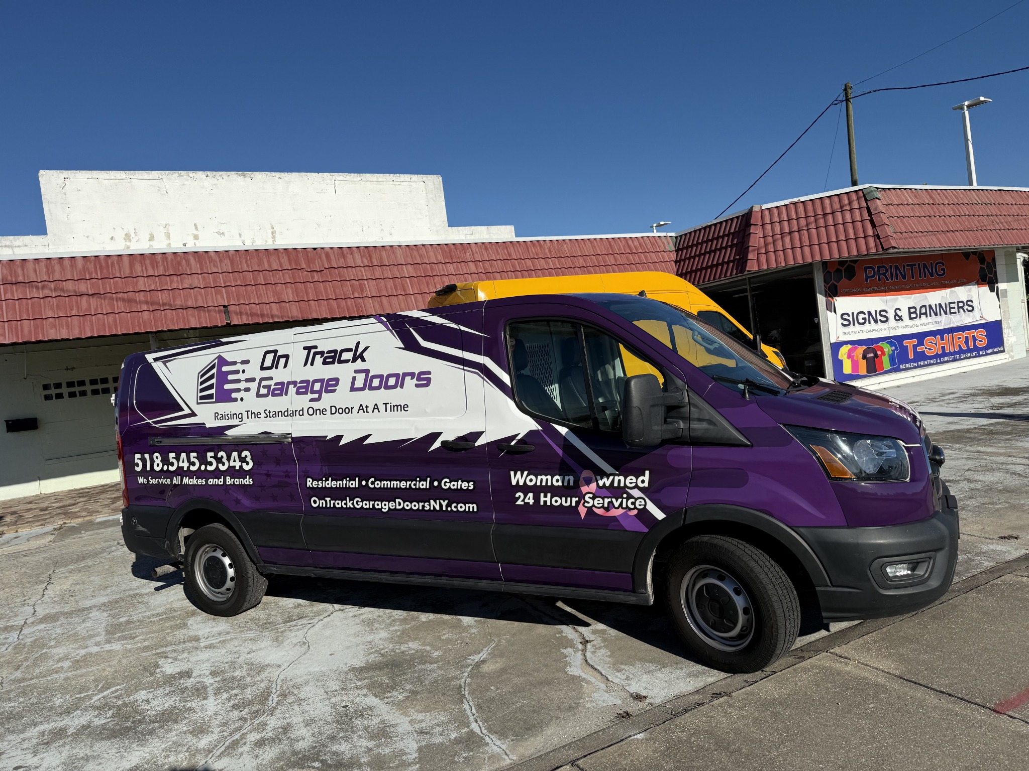 Purple commercial van wrap