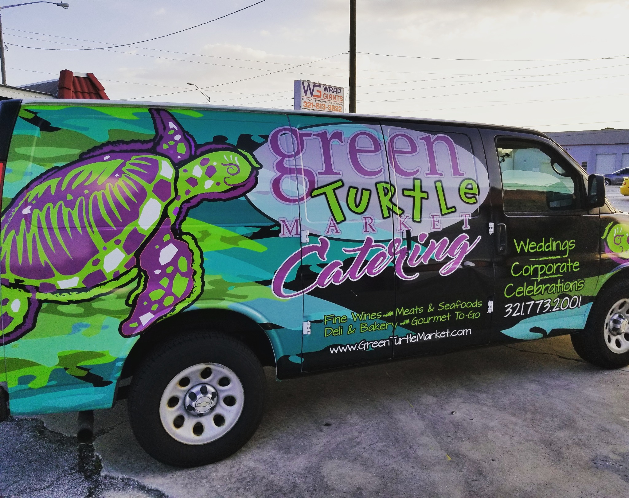Green commercial service van graphics by Wrap Giants