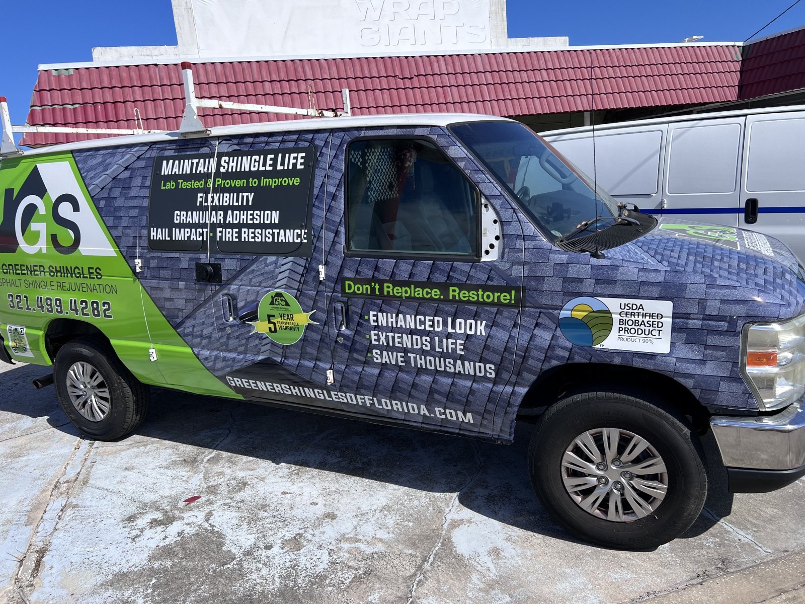 Garage-floor business van graphics