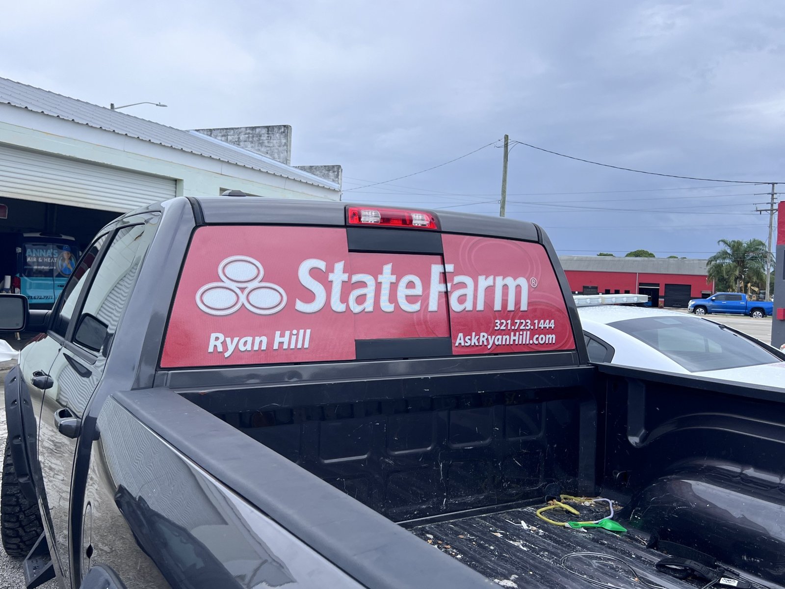 State Farm rear-window graphics