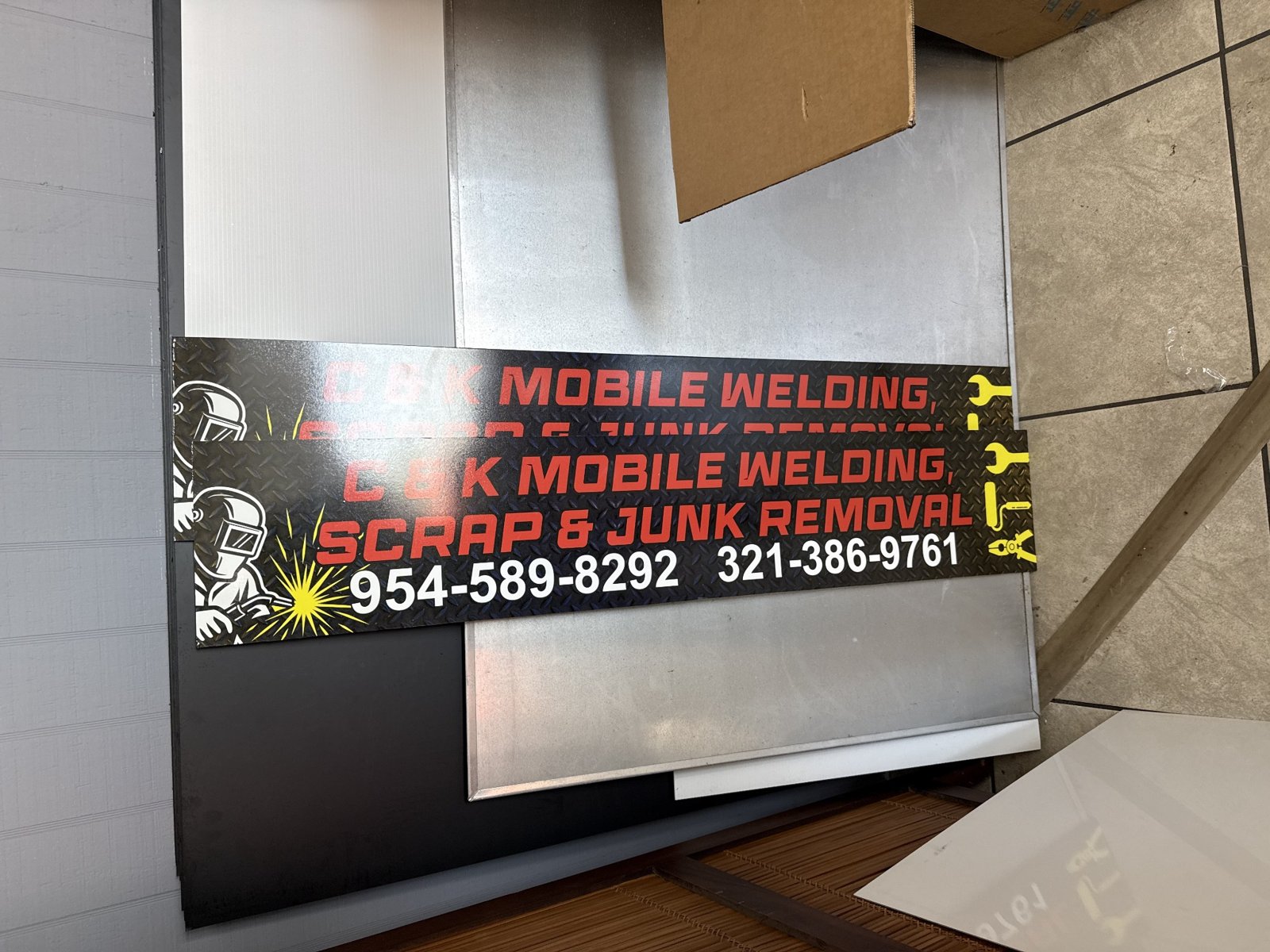 C&K mobile welding and scrap-removal signs