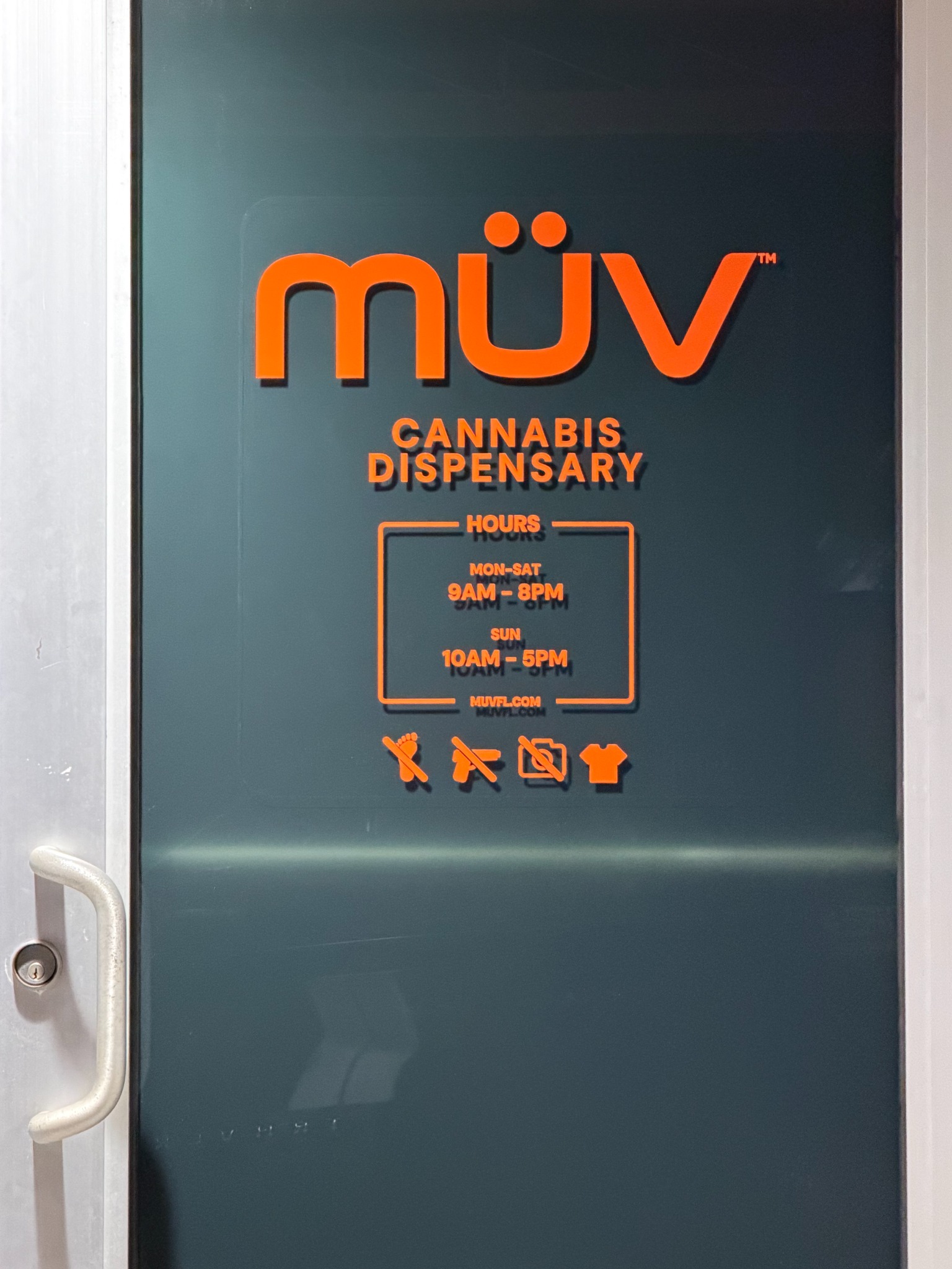 MUV storefront door and window graphics installed by Wrap Giants